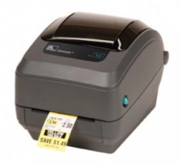 Kompakter Thermodrucker druckt ein farbiges Etikett